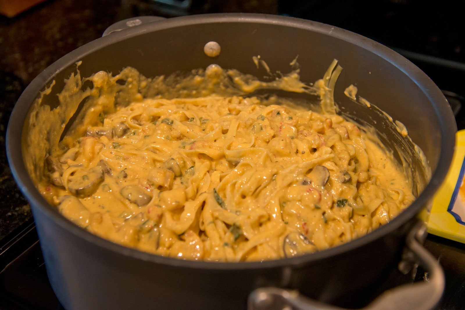 an image of a bowl full of food on the stove