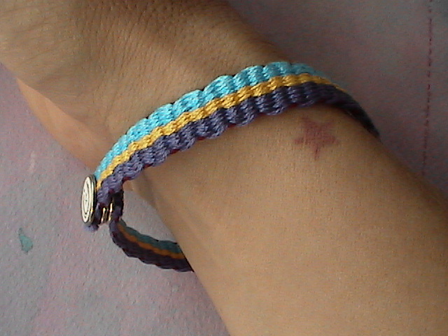 a wristband that has been crocheted with two bands