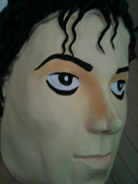 an old wig has been painted to look like michael jackson's face