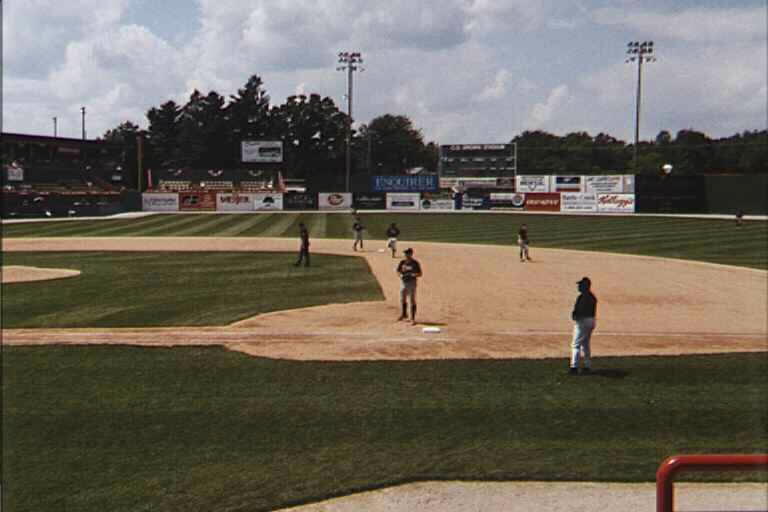 an image of a baseball game on a sunny day