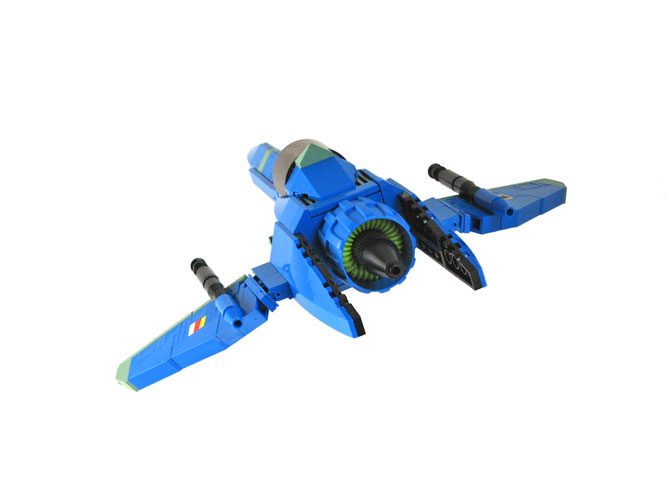 a toy blue plane is in the air