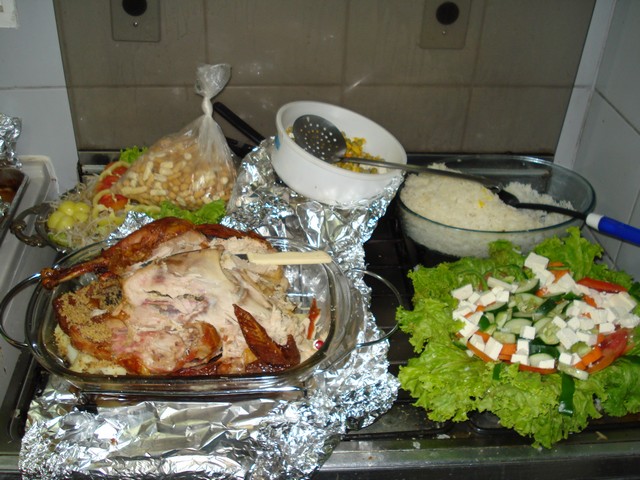 a large variety of food is on the stove