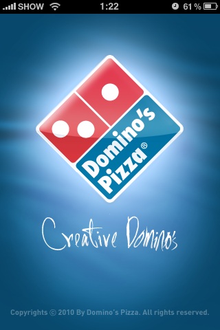 a blue wall with domino's logo and an ad for the pizza shop
