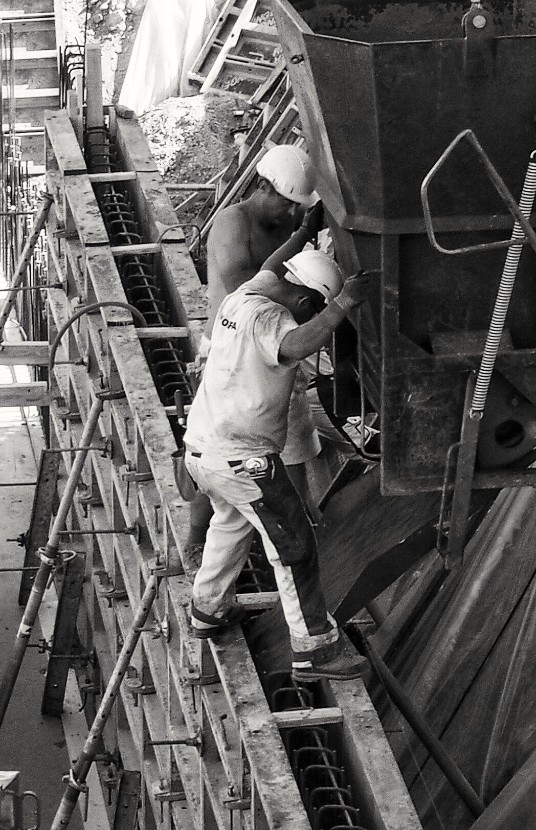 a black and white po of a man working