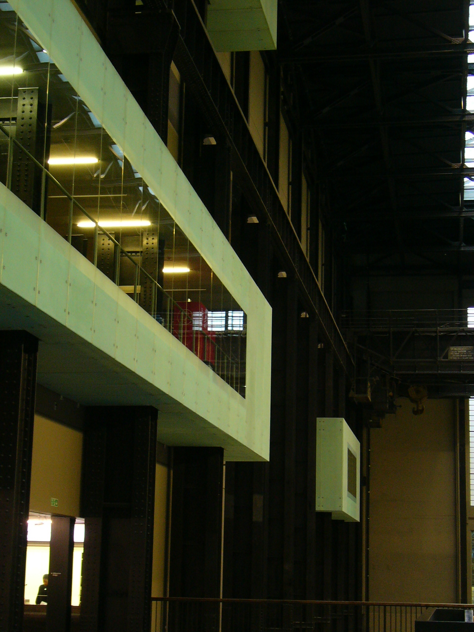 a dark, empty hallway inside an office building