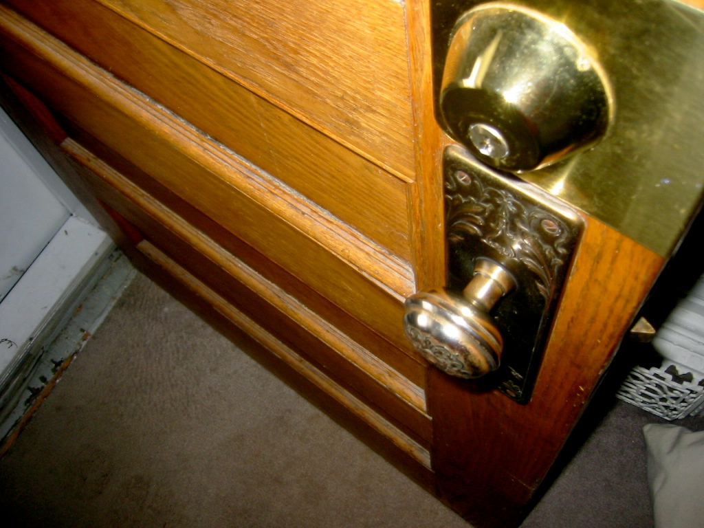 a key is in a cabinet with the door open