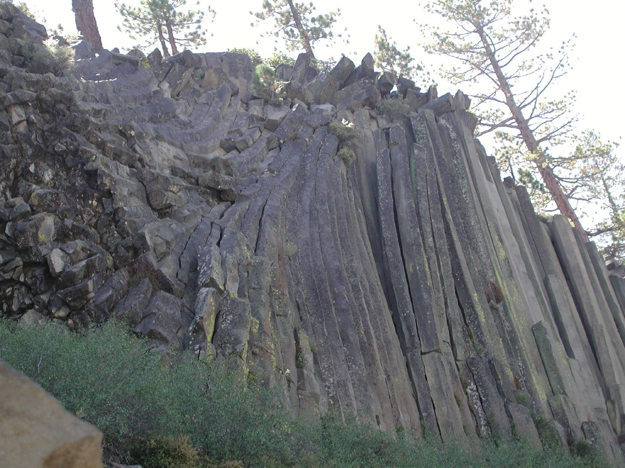 a rocky mountain has been carved with wood