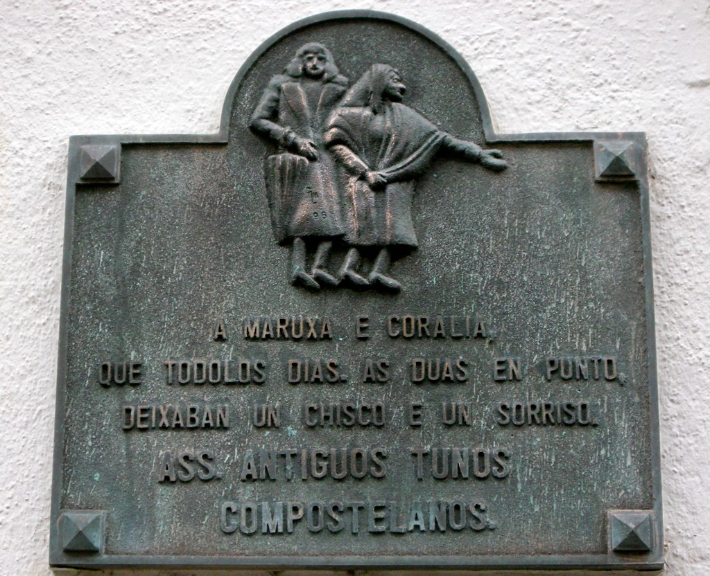 a plaque with spanish writing at the base