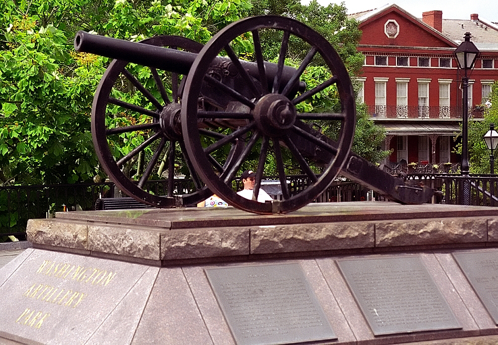 a close up view of a monument with a cannon