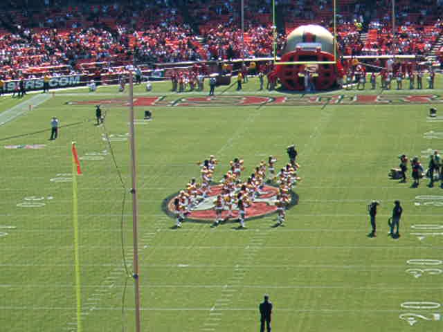 a football game is being played by the fans