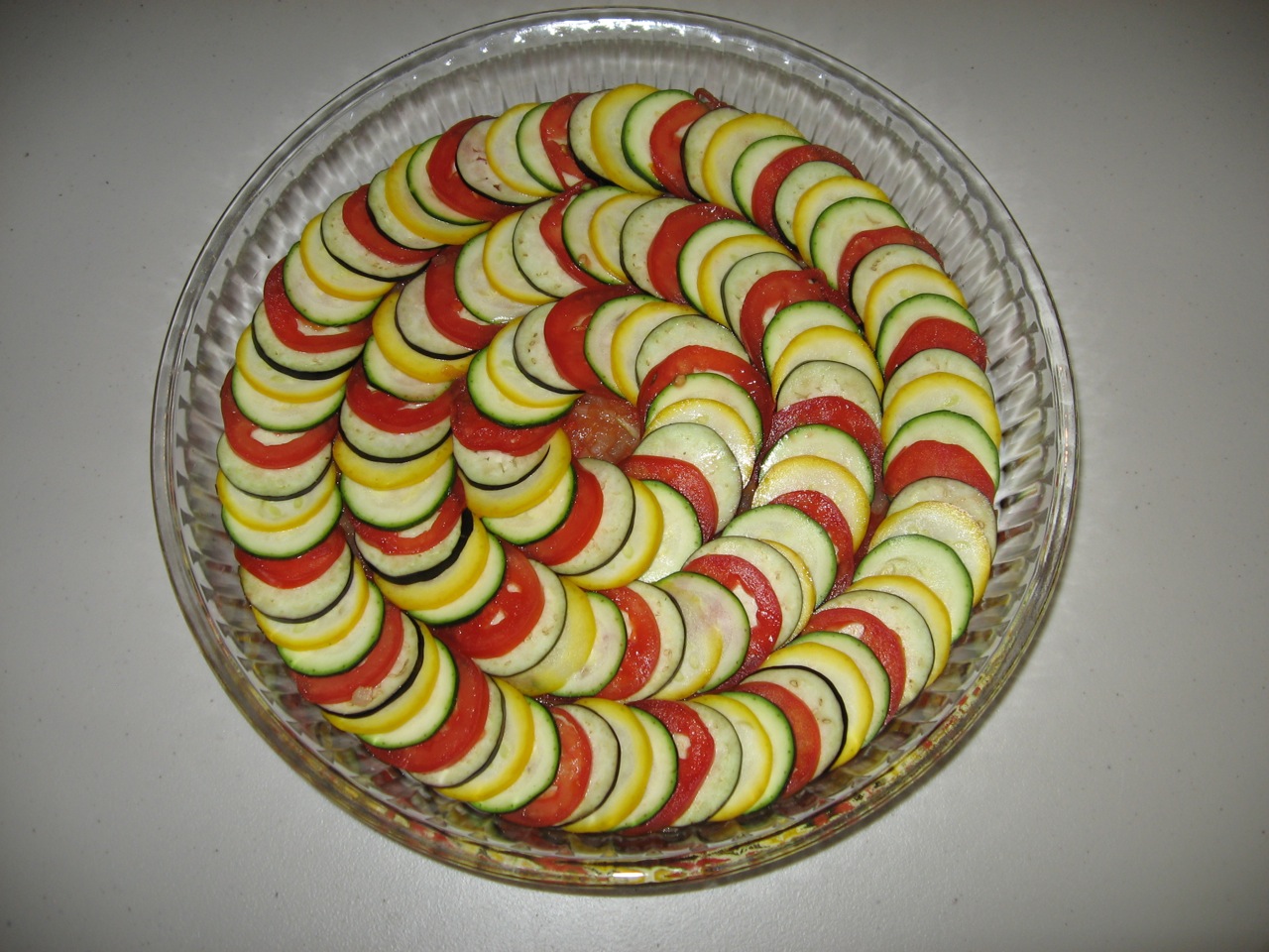 an image of a bowl of sliced vegetable