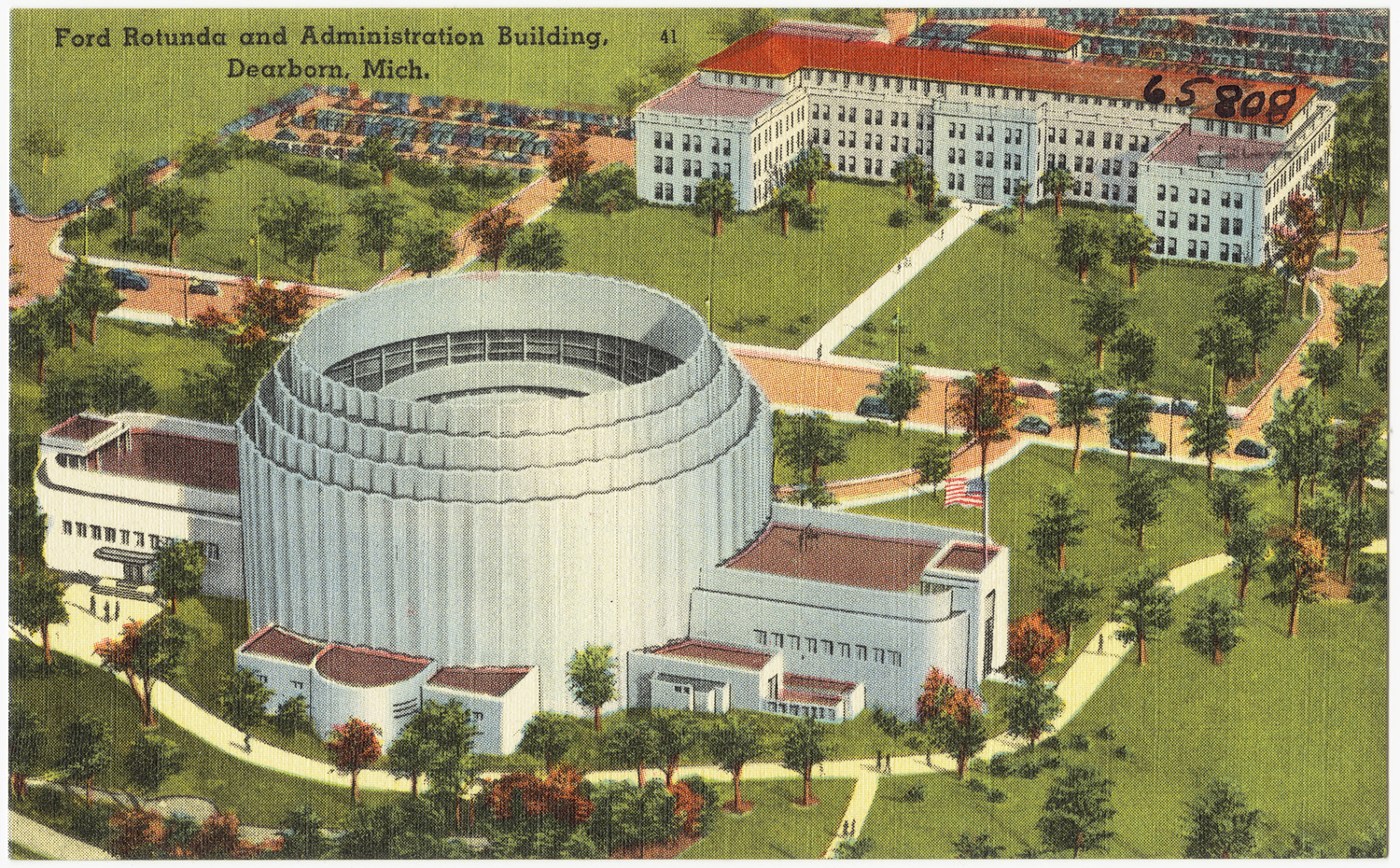 an aerial view of the oval shaped building with an observation dome on top