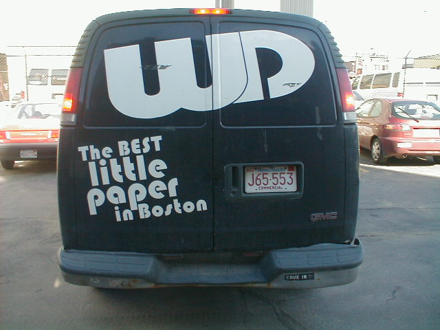 an ad for the u s department in boston on a black van