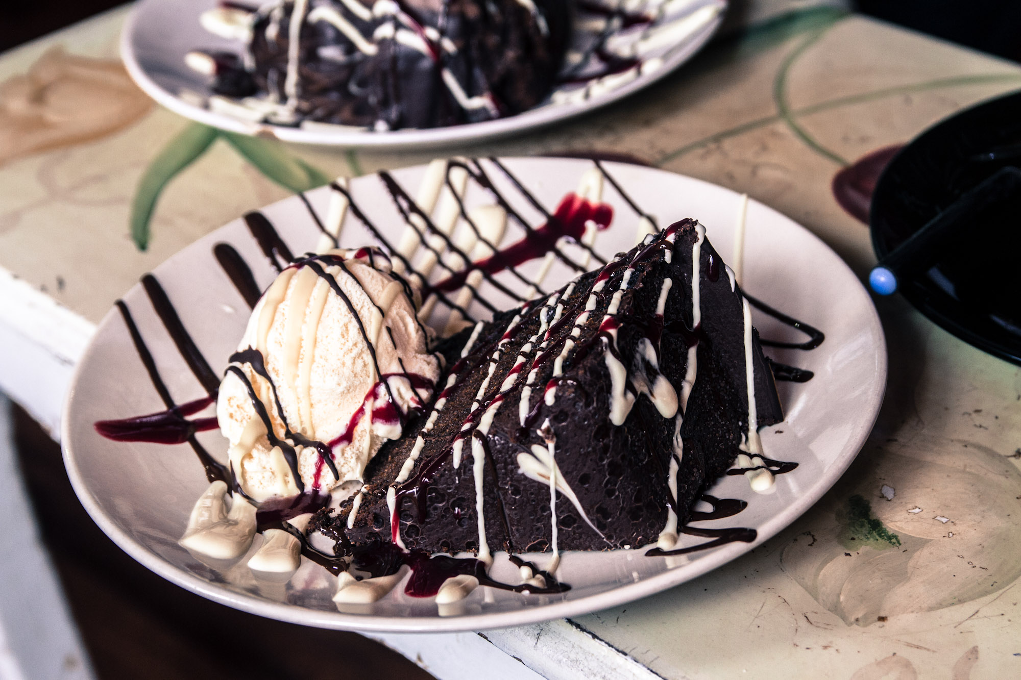 there is a slice of chocolate cake on the plate