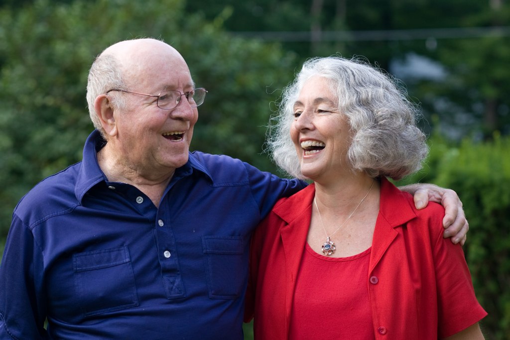 a man and a woman pose for a po together