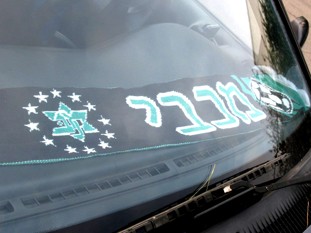 stickers painted on the hood of an automobile are seen here