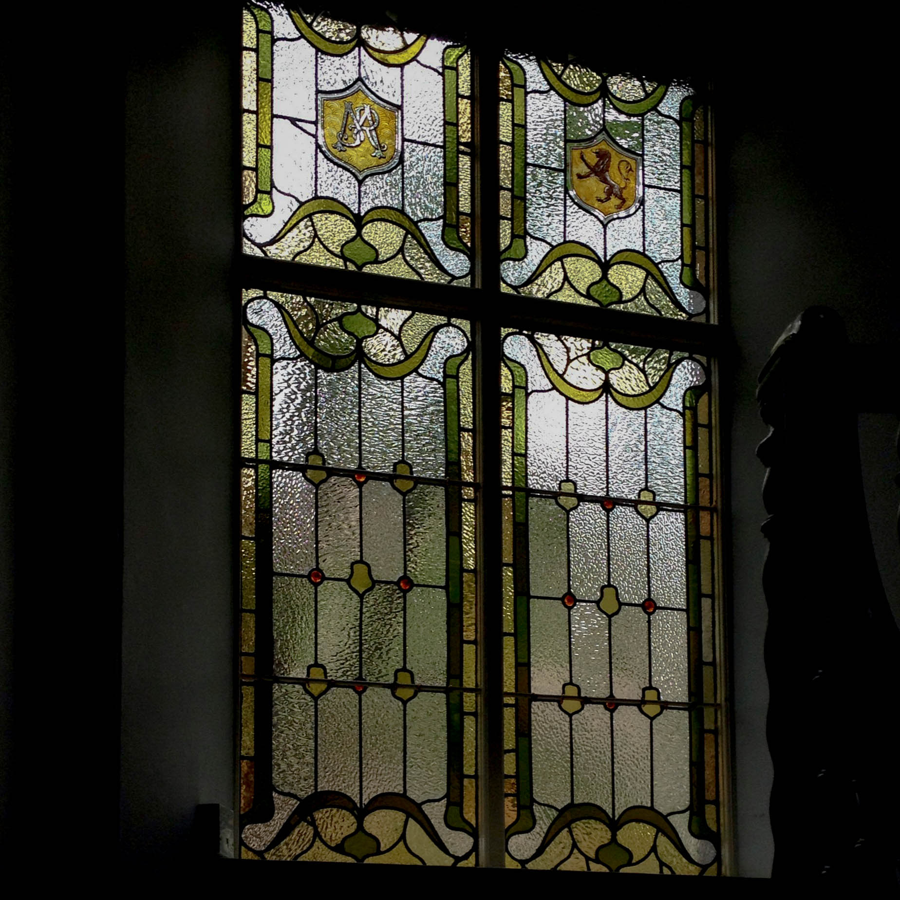 a window that has been decorated with different colors