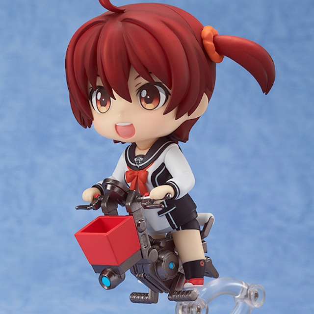 a girl on a toy motorcycle is dressed in a school uniform