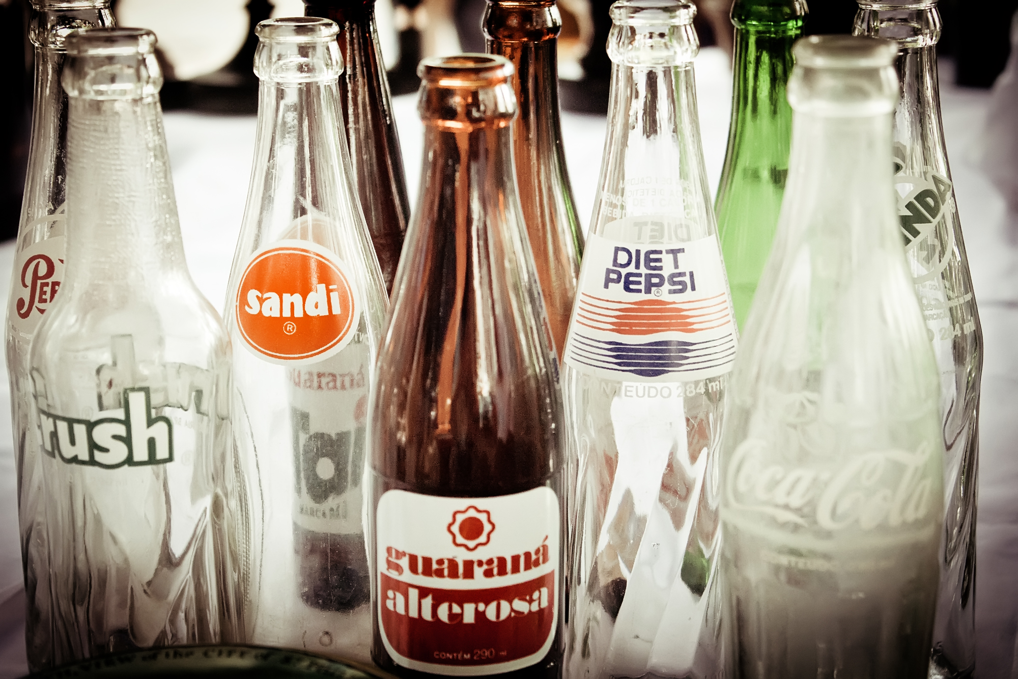 several empty bottles sitting on top of a table