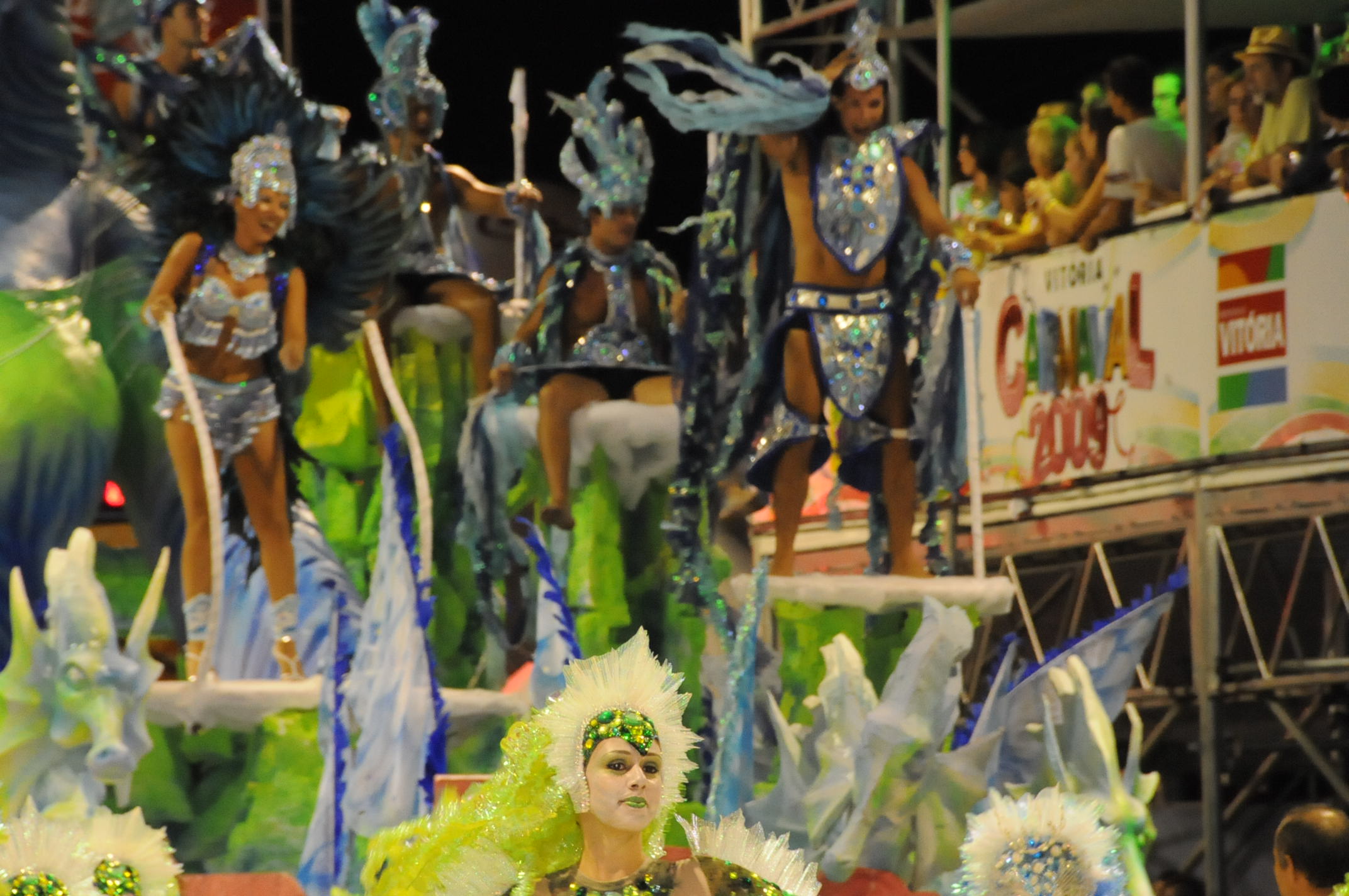 some girls are in colorful costume on the stage