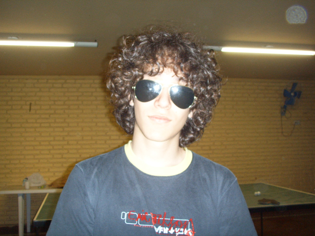 a person with a black shirt and some sunglasses