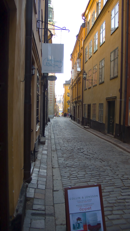 this is an old - fashioned street with yellow buildings