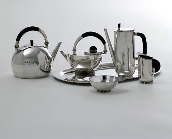 stainless tea pots, cups and trays with handles