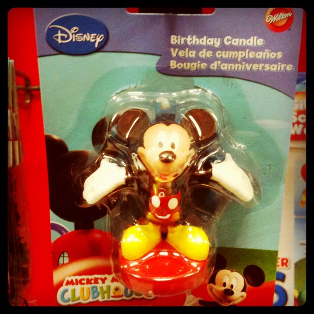 a toy figure of mickey mouse from mickey world