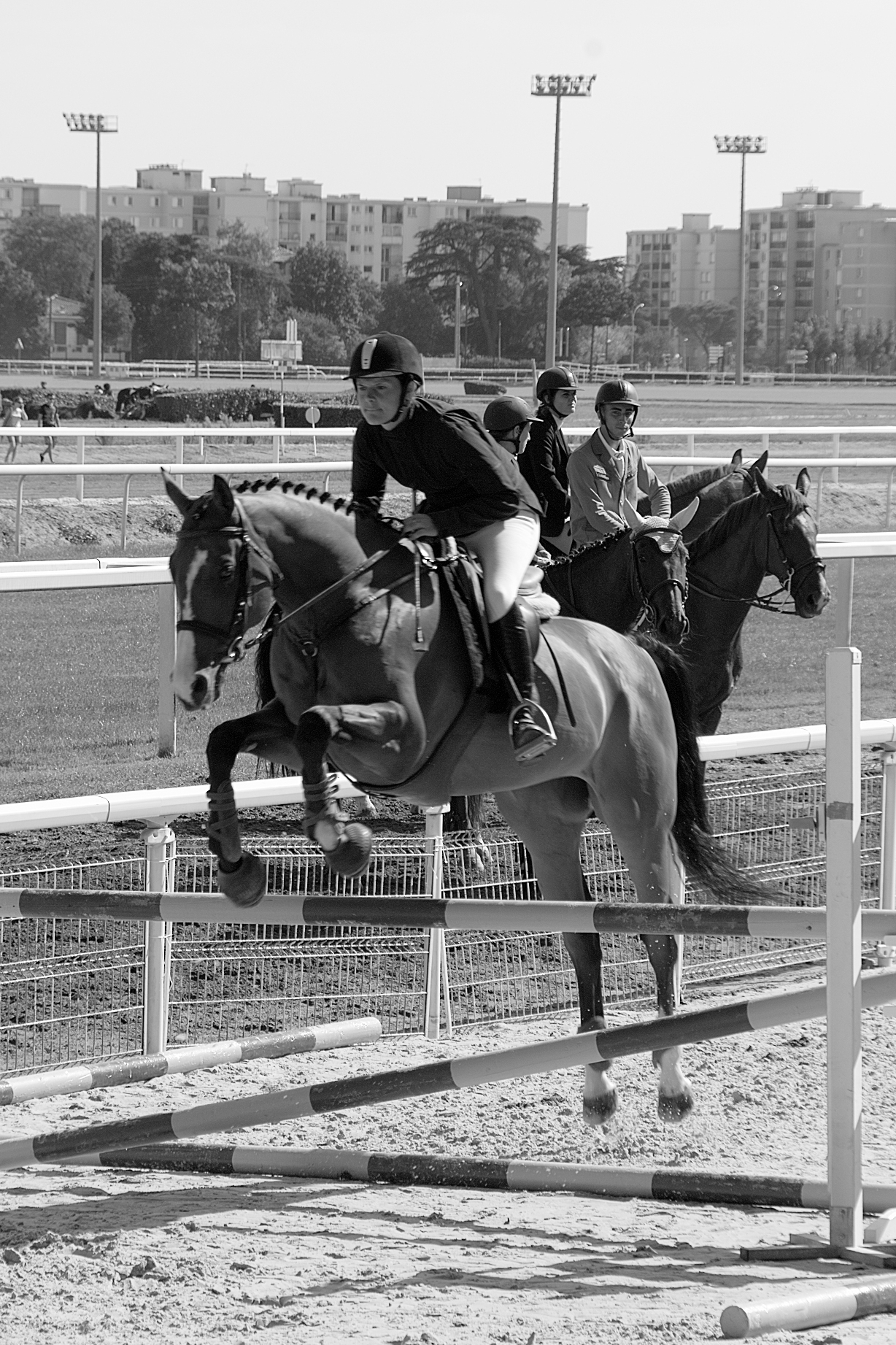 some people are riding on top of horses