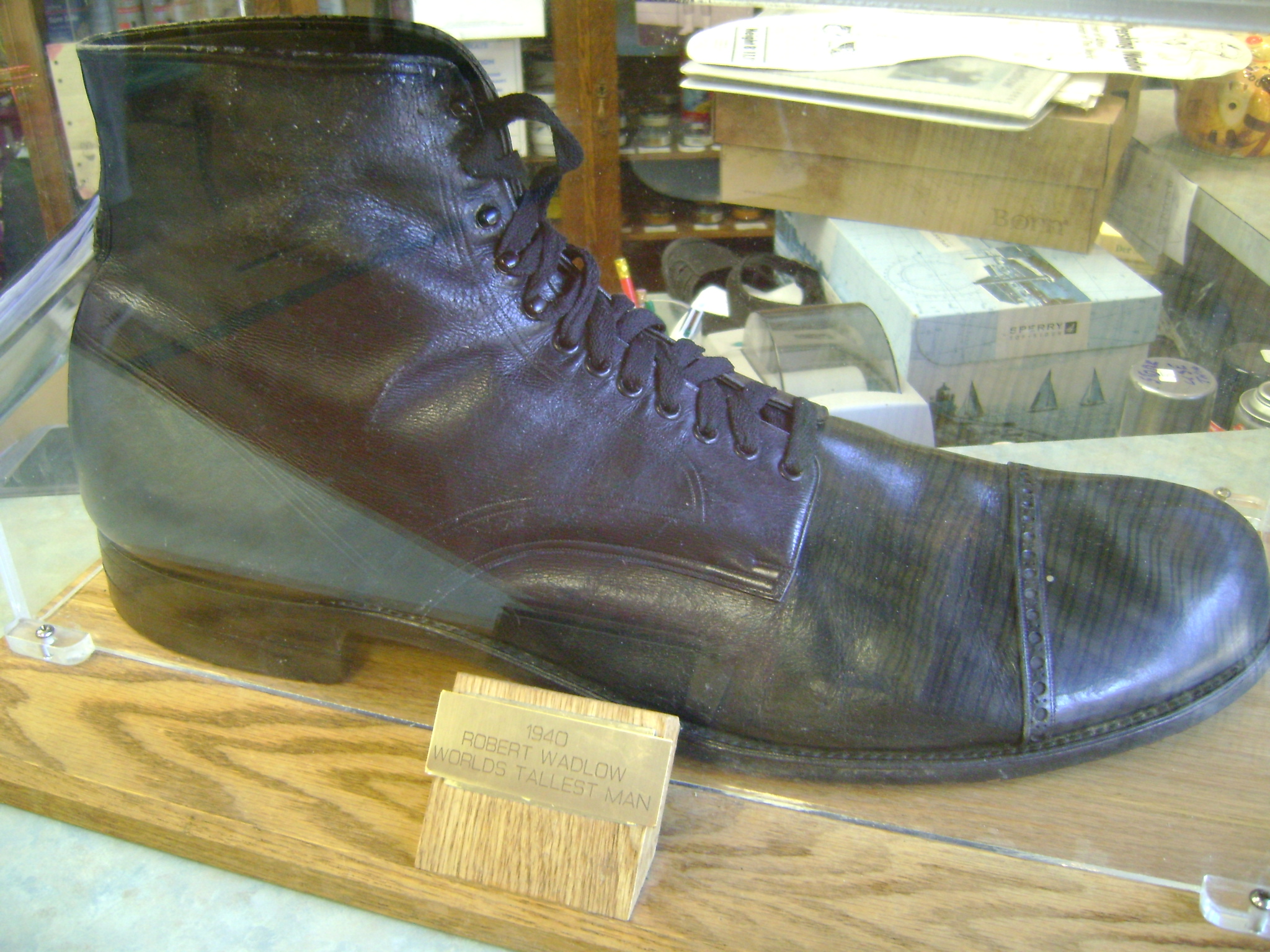 a boot is sitting on a wooden platform