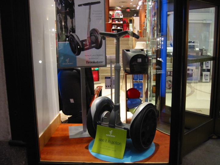 a display case with a pair of speakers in it