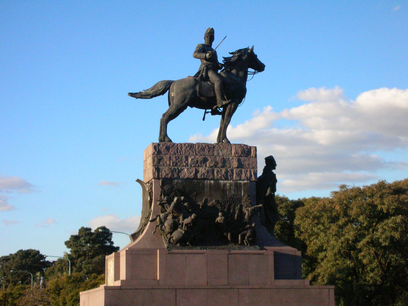 there is a statue of a person on a horse