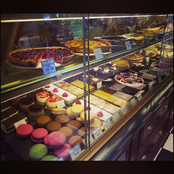a display case with lots of different types of food