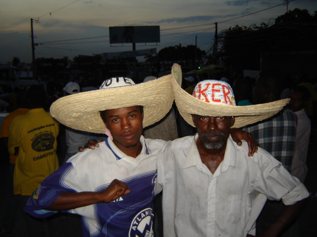 two men with large hats at an event