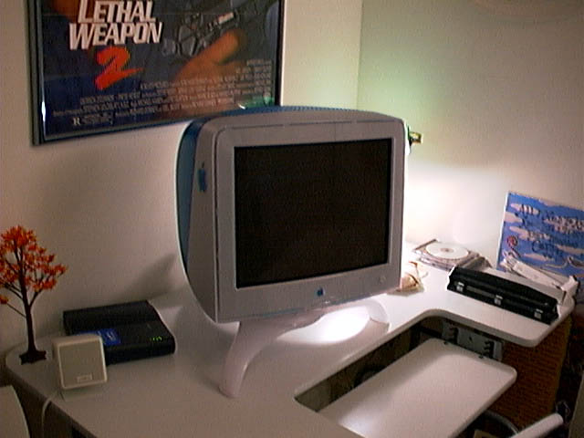 this computer is sitting on top of a desk