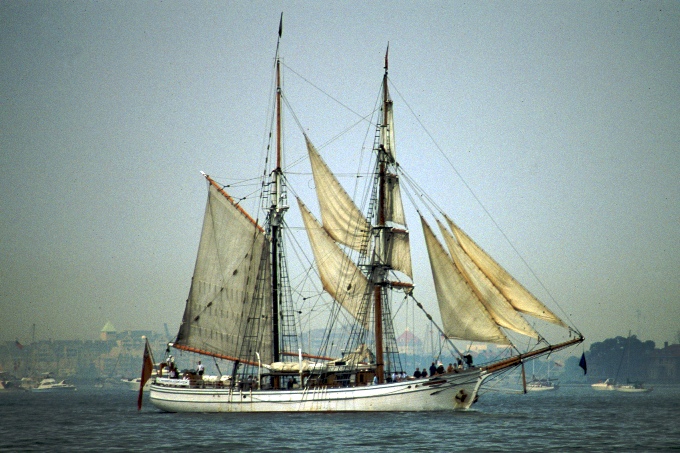 a large sailing boat on top of a body of water