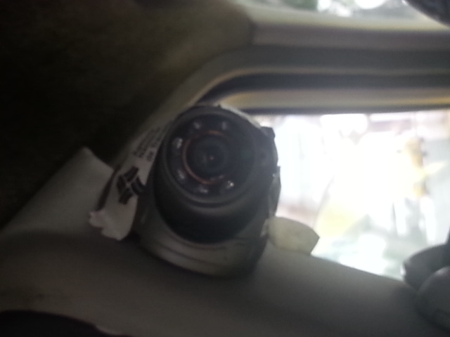 the dash camera is in front of an suv