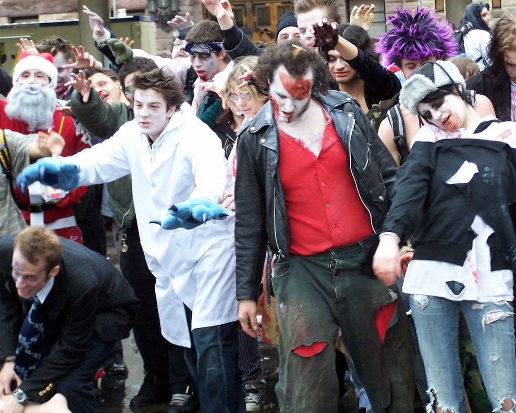 a group of people wearing clown make up and costumes
