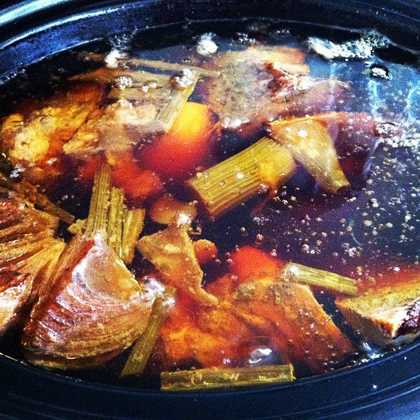a pot of stew with meat and vegetables