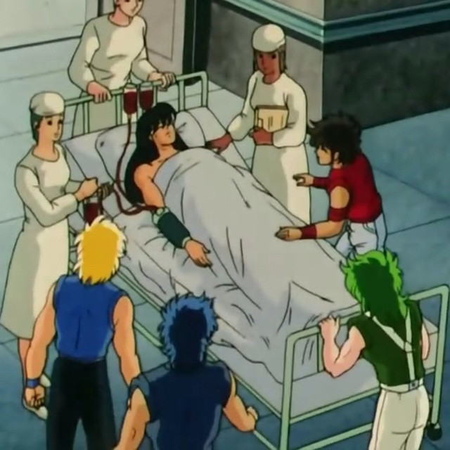 a cartoon image of a group of people gathered around a hospital bed