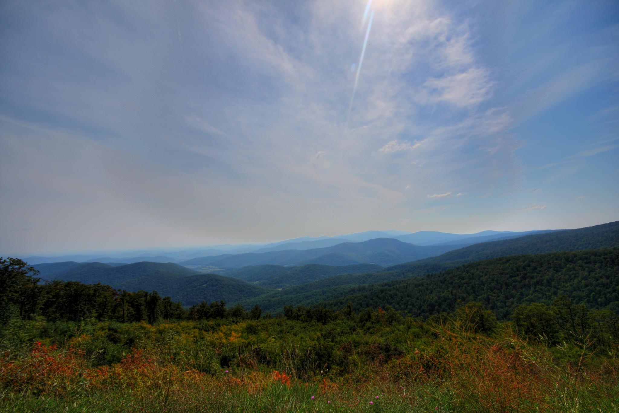 the view is in the distance of a blue sky