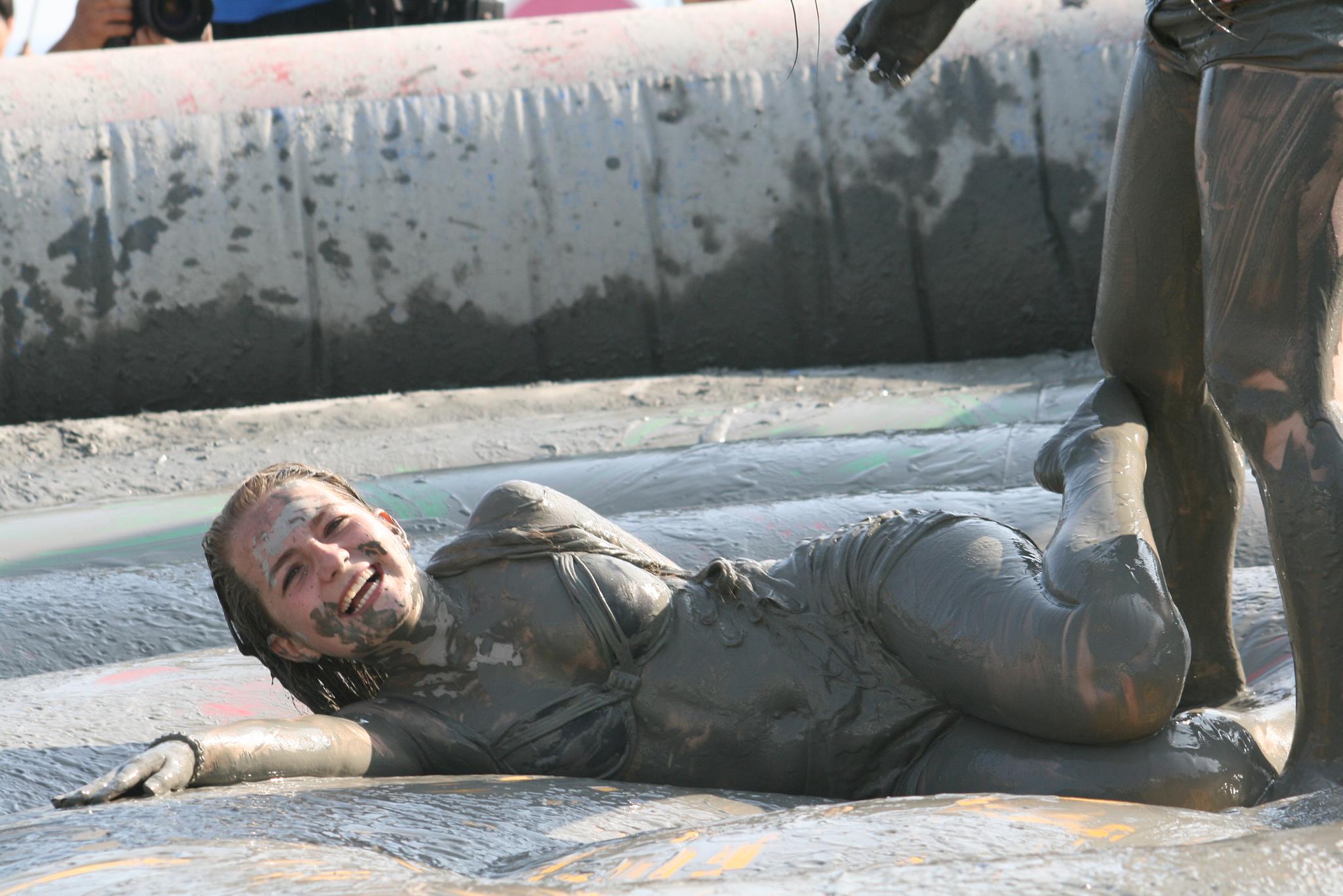 the man is laying down on the concrete