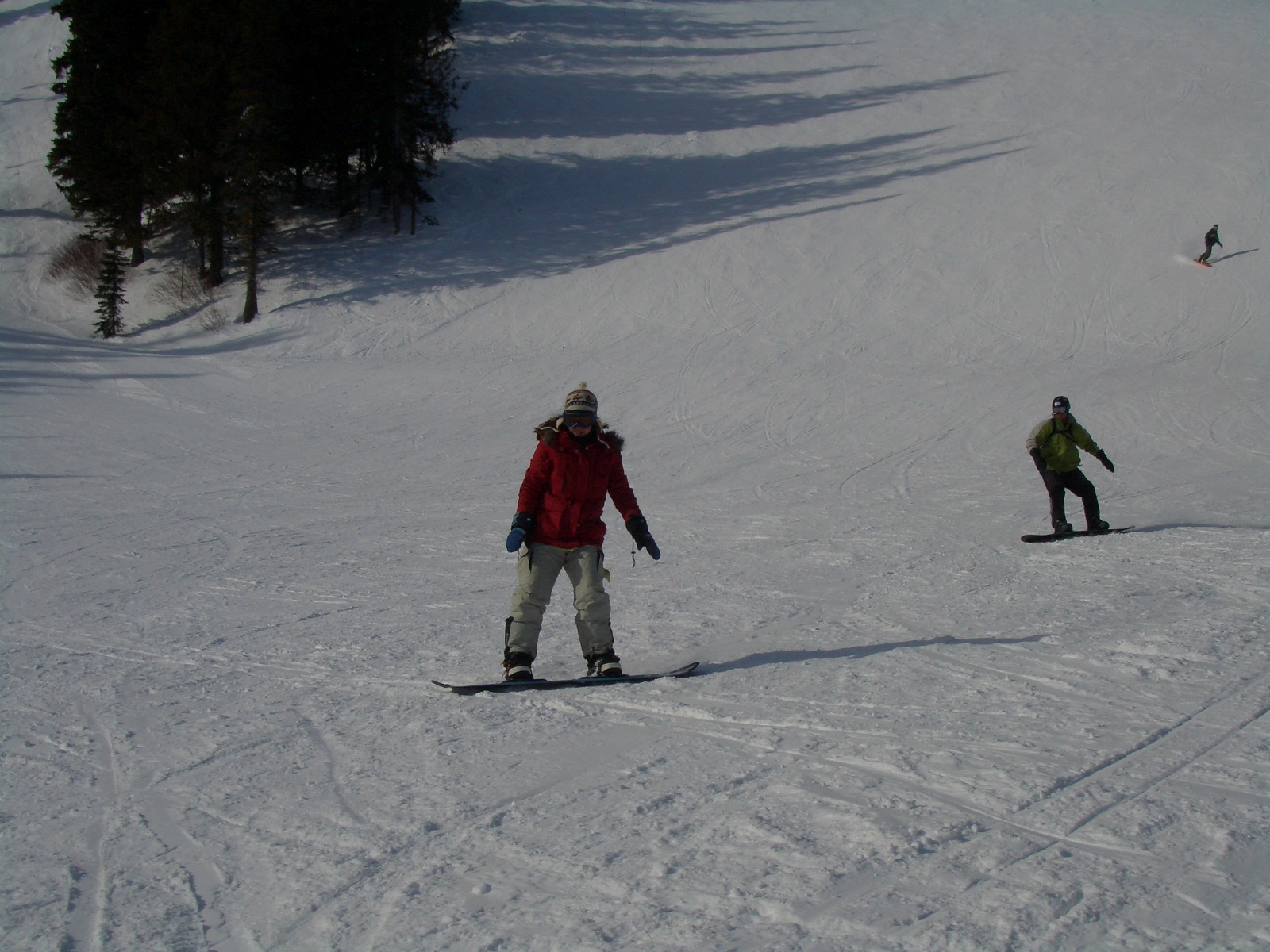 a person riding skis on a snowy surface