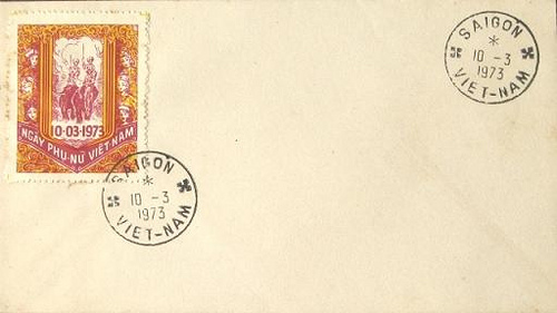 an envelope with stamps on it is displayed