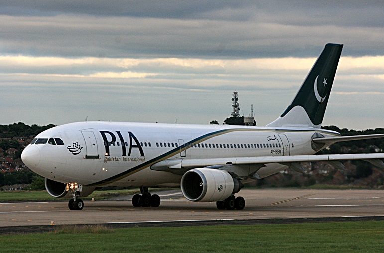 a pakistan airlines plane on the runway