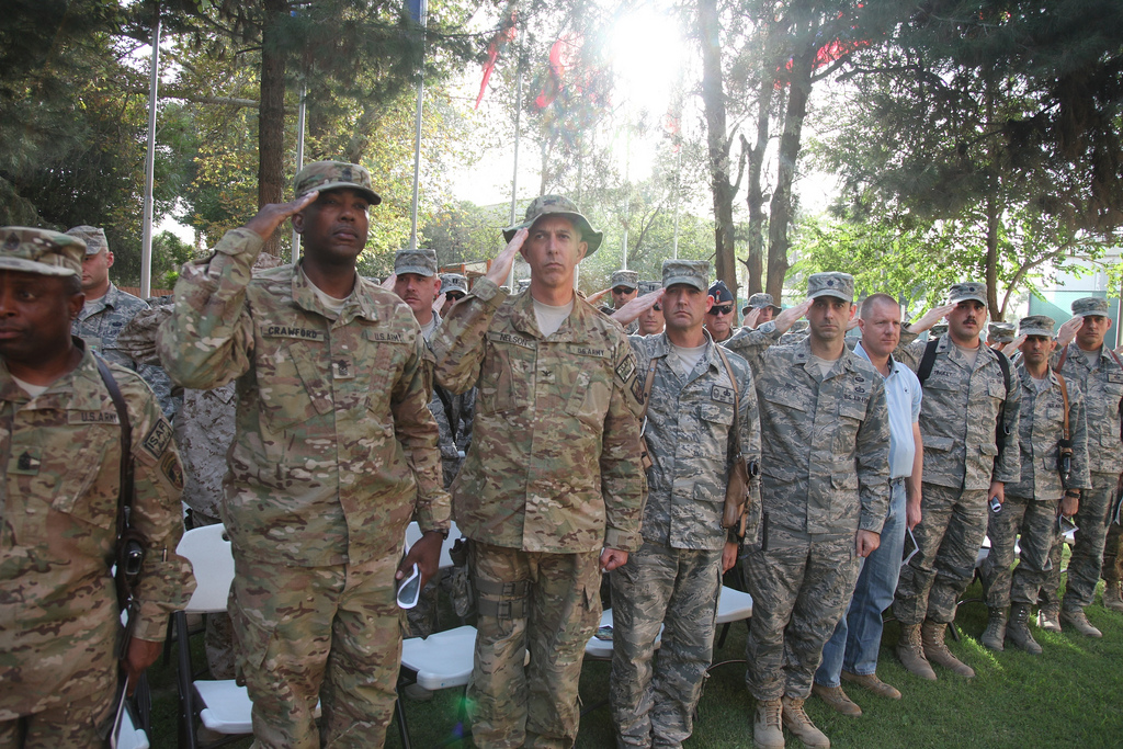 a group of men in uniform standing next to each other