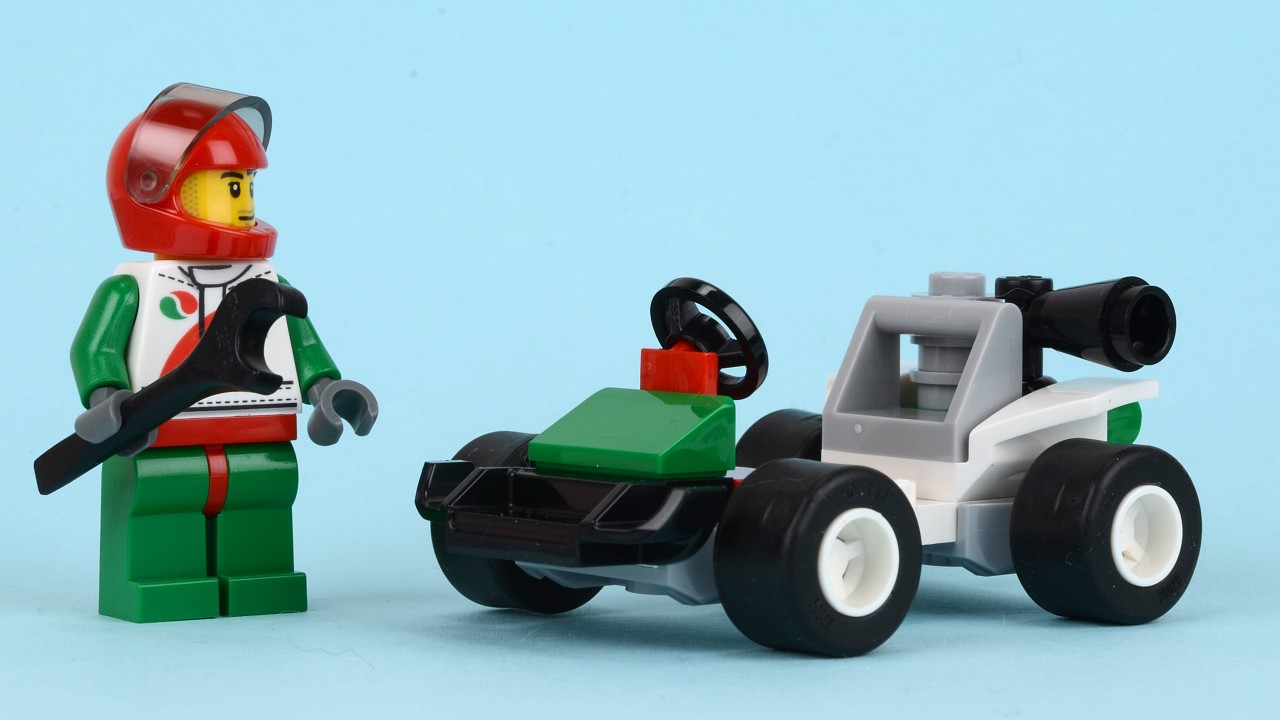 two toy vehicles that include an army jeep and a small army vehicle