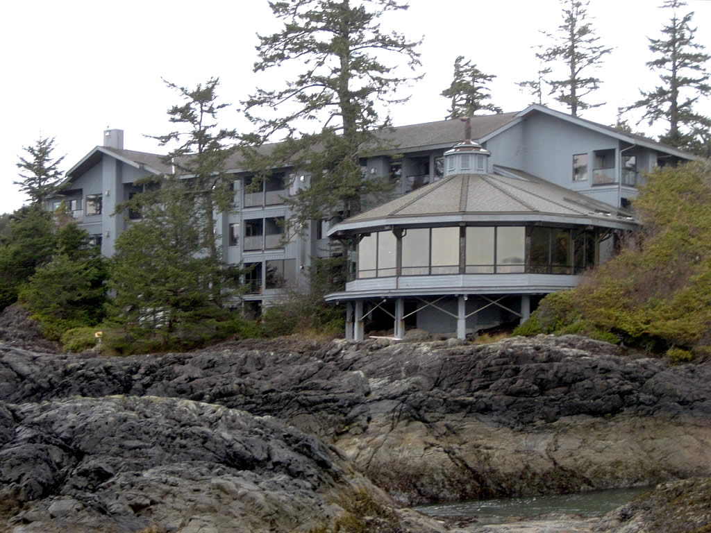 the exterior of a resort building on an island