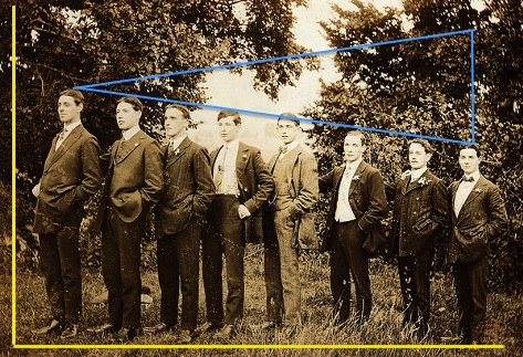 a group of men standing next to each other