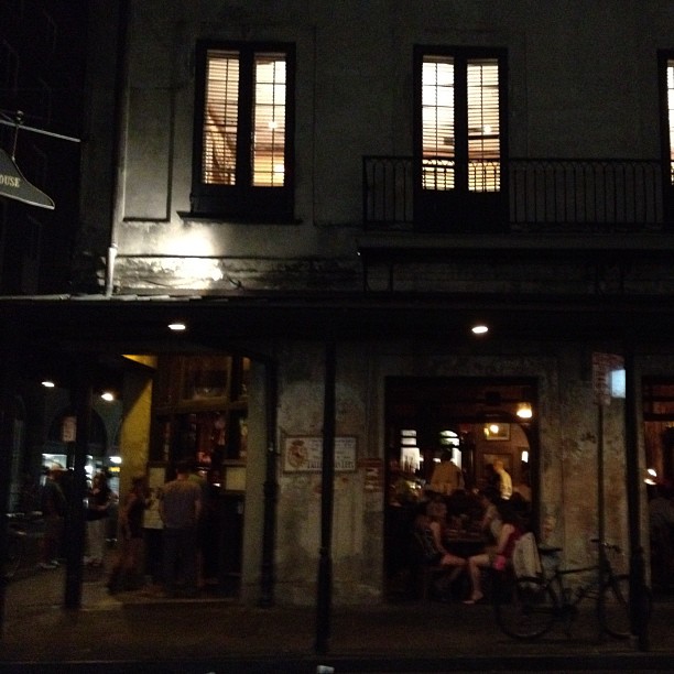 the restaurant at night with many people on the street